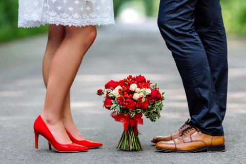 Bride and Groom, red shoes and bouquet